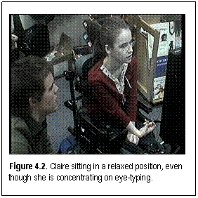 Figure 4.2. Claire sitting in a relaxed position, even though she is concentrating on eye-typing.