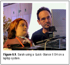 Figure 6.9. Sarah using a Quick Glance II SH on a laptop system.