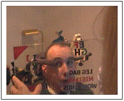 Michael using the E-tran frame to communicate with his wife