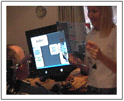 Michael communicating with his wife using the E-tran frame