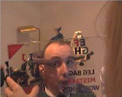 Michael finds communicating with this E-tran frame too slow and hopes that eye control will enable him to speed up the way he talks to family and friends